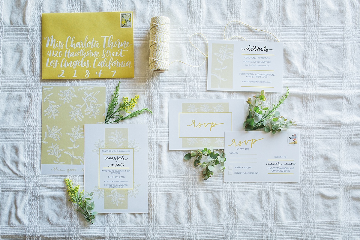 Yellow and white stationery suite for a wedding invite