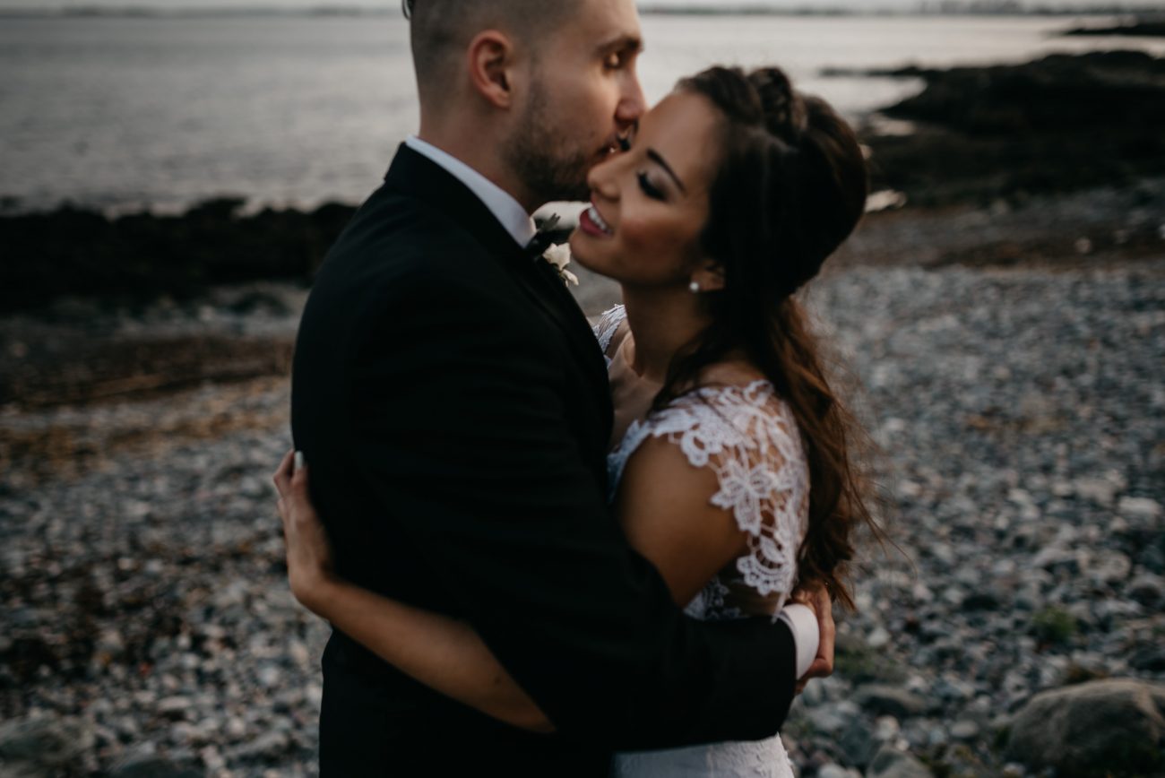 Dark and moody photo of a bride and groom on the Rising Tide Society and HoneyBook blog