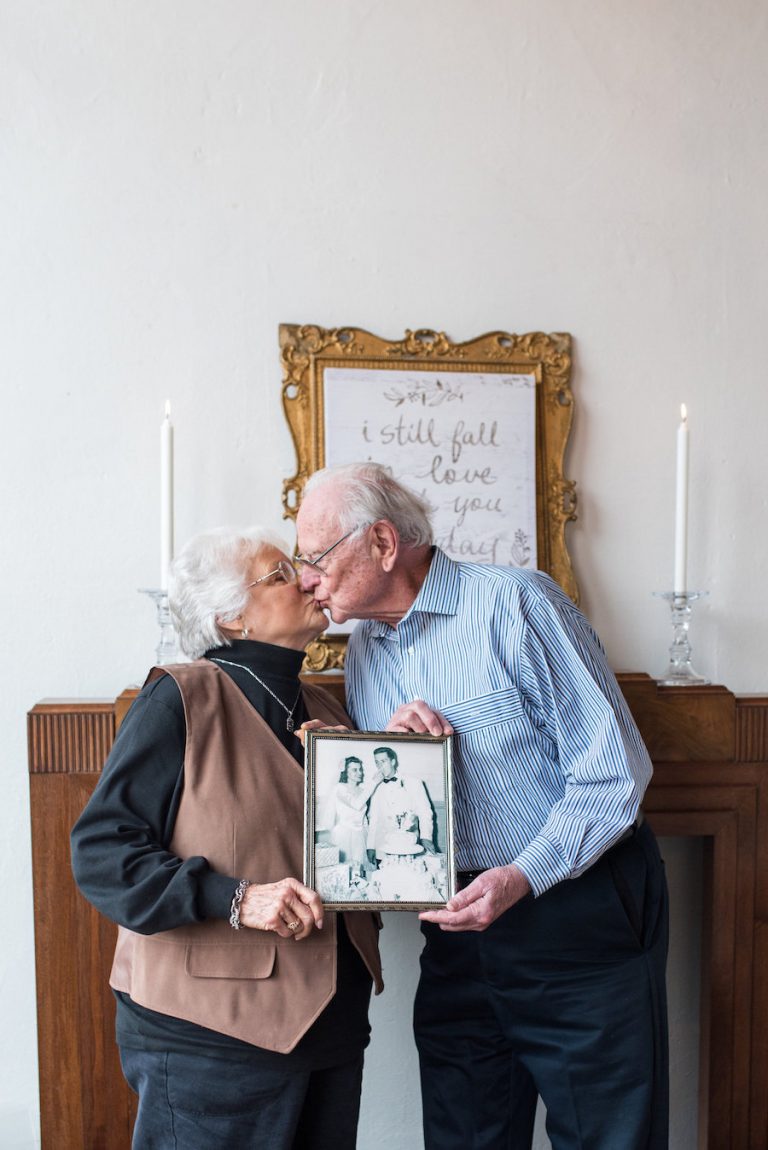 Couple kisses at their 65th anniversary photoshoot