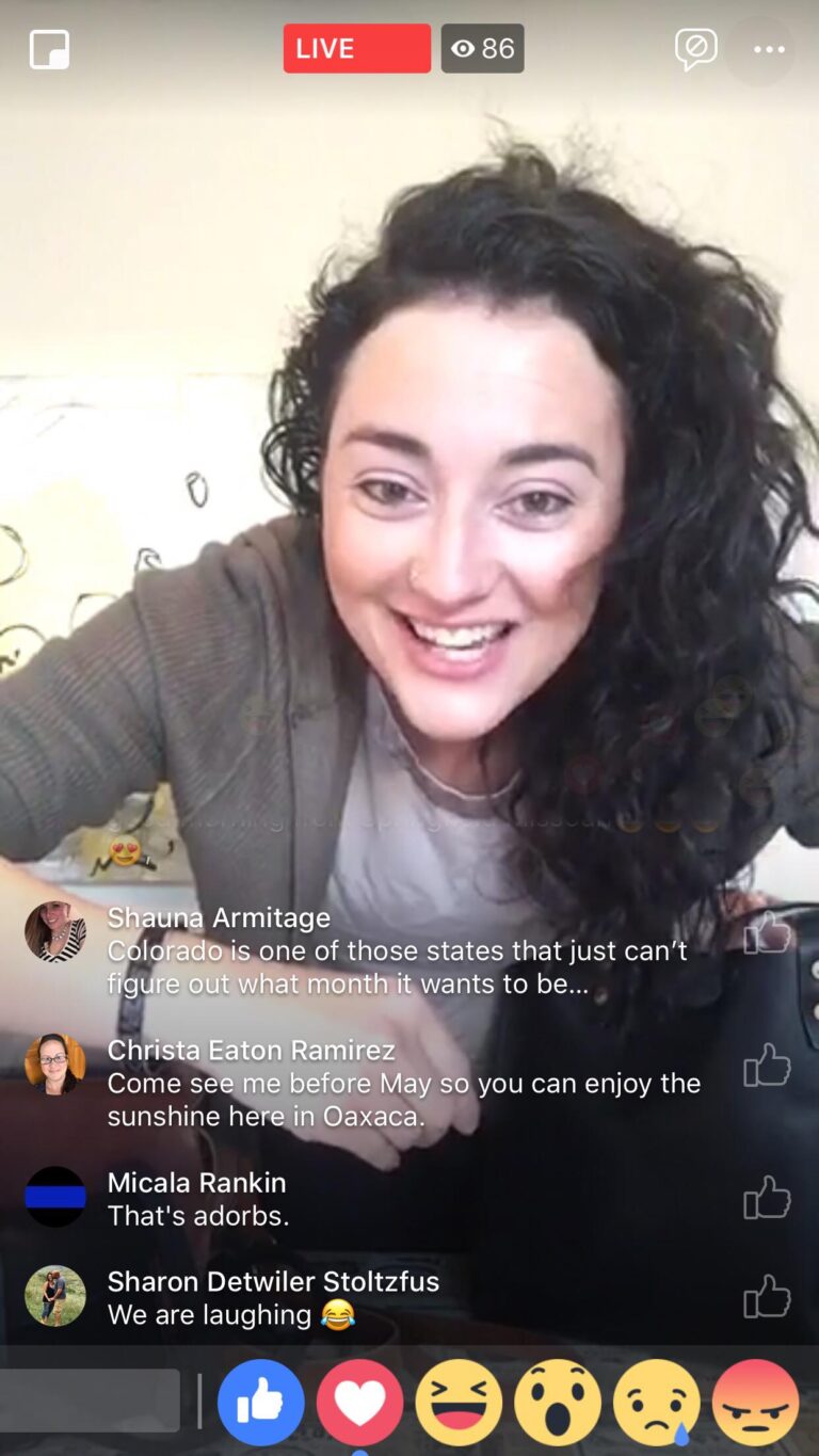 A woman leans into the camera in a screengrab of a Facebook livestream