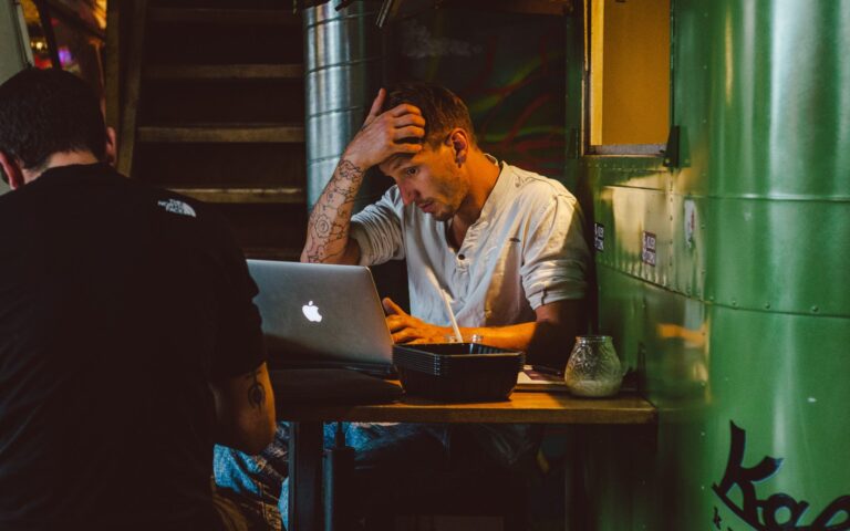 business owner looking stressed over someone copying his business idea