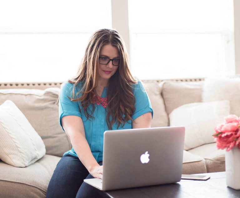 Becky Mollenkamp works on her laptop.