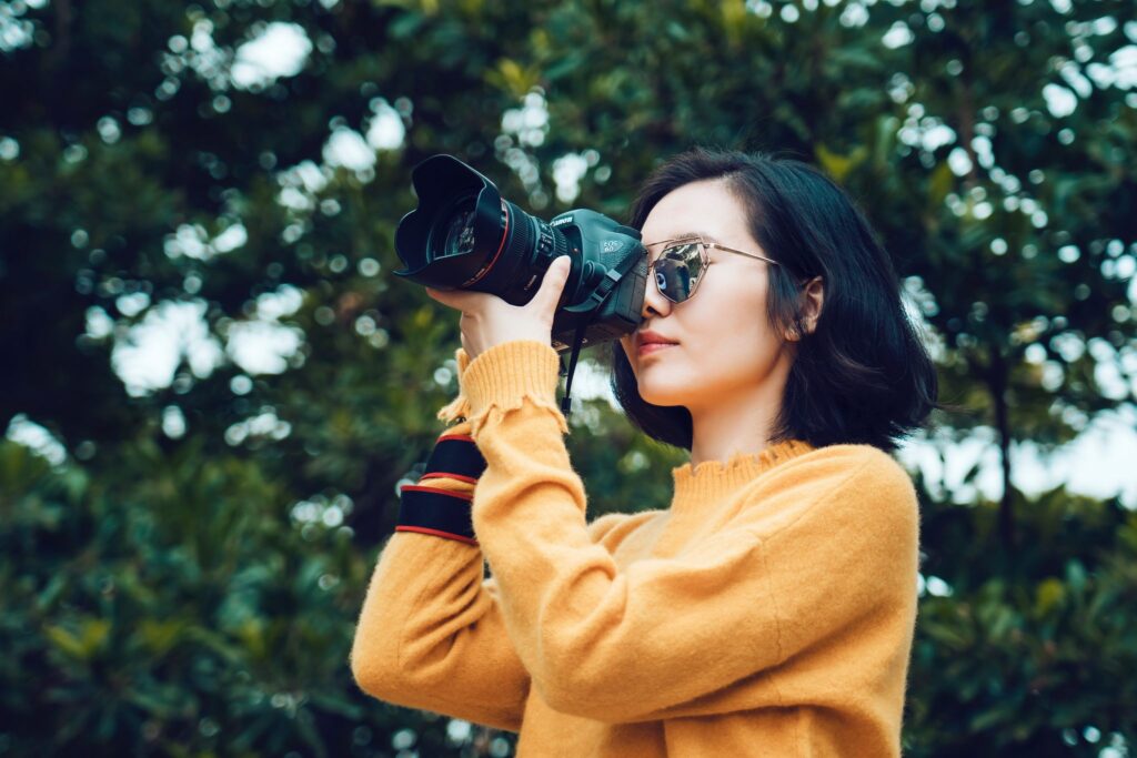 photographer taking a picture in nature