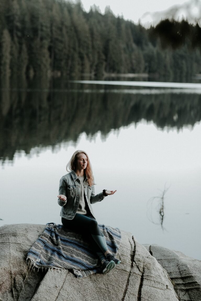 woman relaxing in a peaceful looking environment