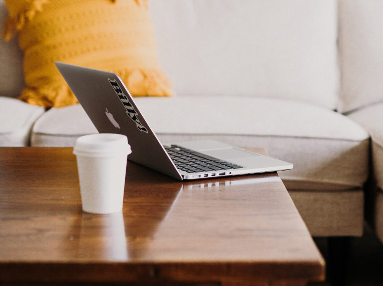 laptop on a coffee table