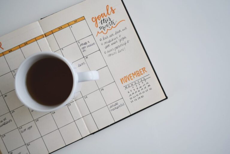 a calendar with a coffee cup on it