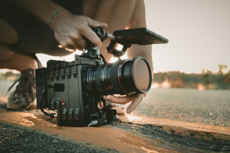 videographer using an expensive looking camera