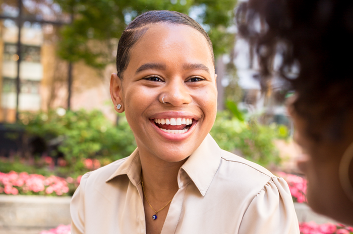 woman smiling in conversation