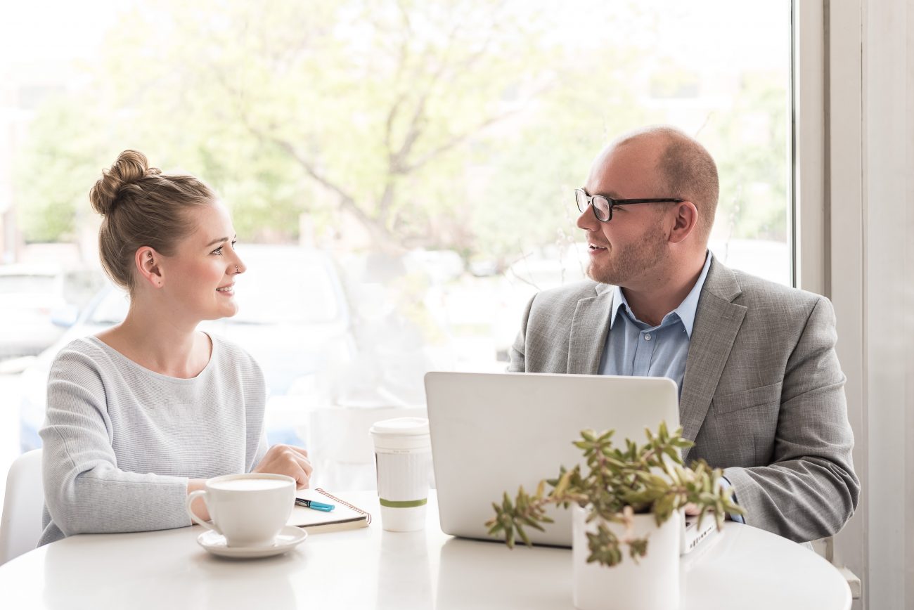 accountant and consultant discussing