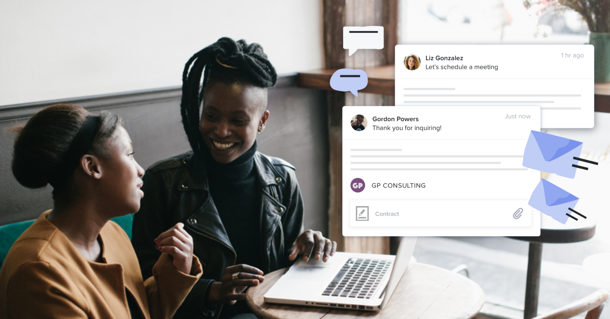 Two black women sit facing each other with a laptop open at a table. Graphics to their right show emails being sent back and forth