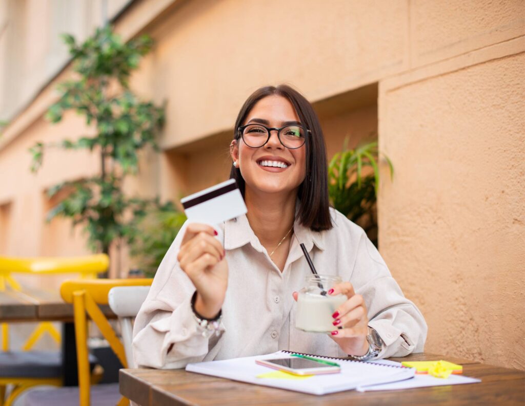 Woman collecting payment with a credit card