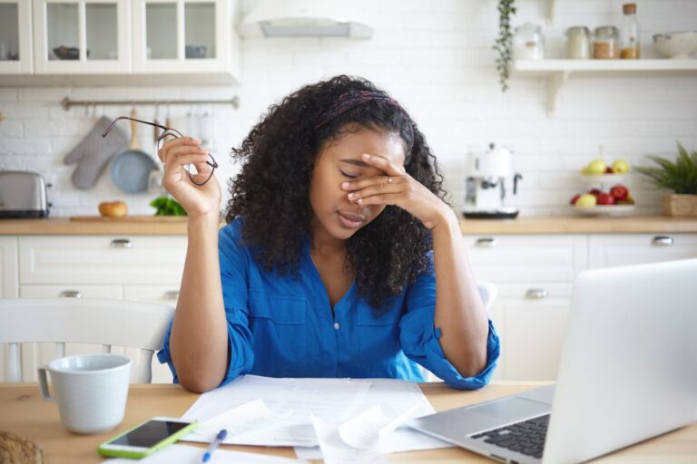 woman at her computer frustrated with email marketing