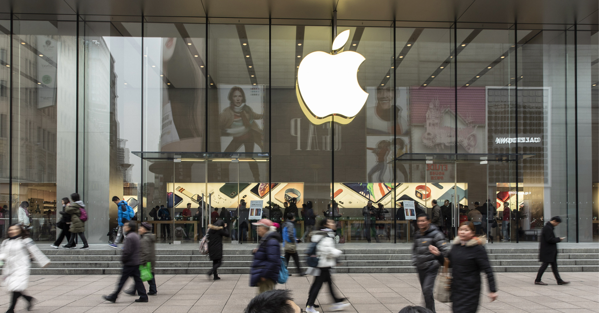 Apple storefront with people walking by