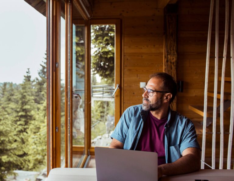 man on a laptop learning How to Create an Authentic Brand Identity