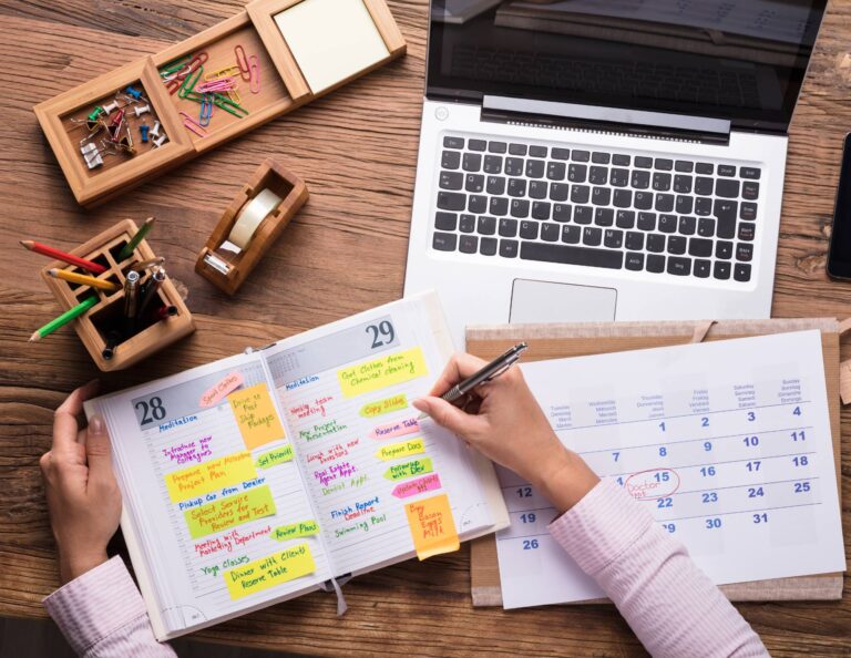 Person using a shared calendar on paper