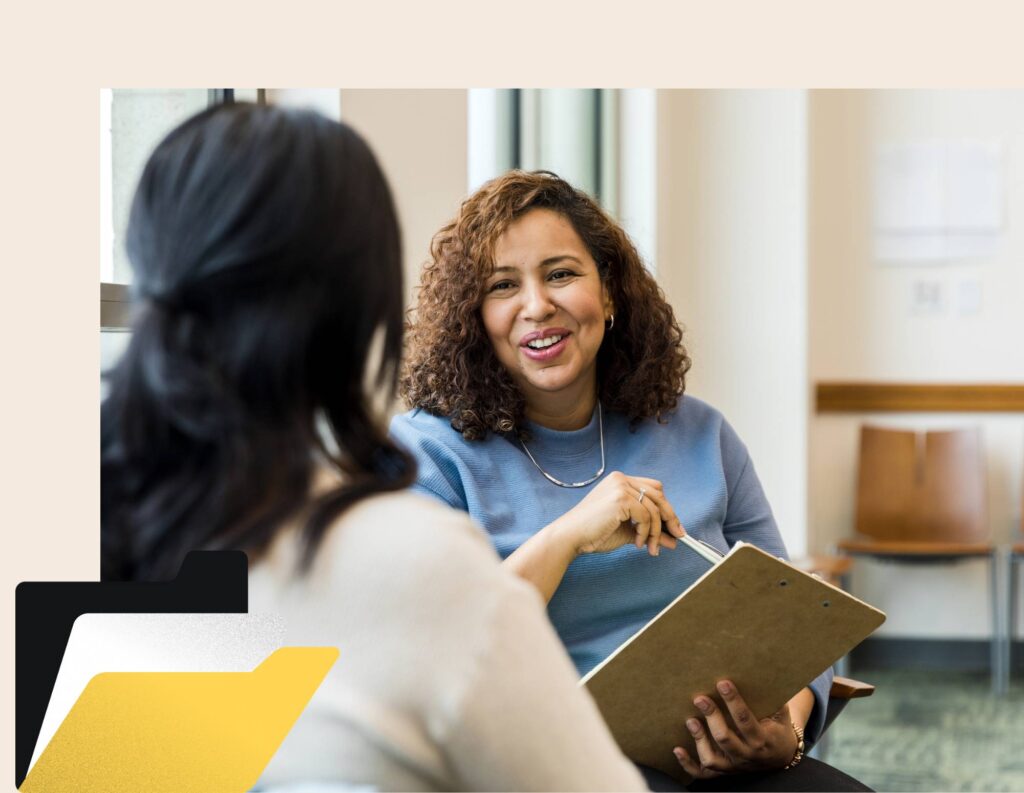 Women working through client onboarding 