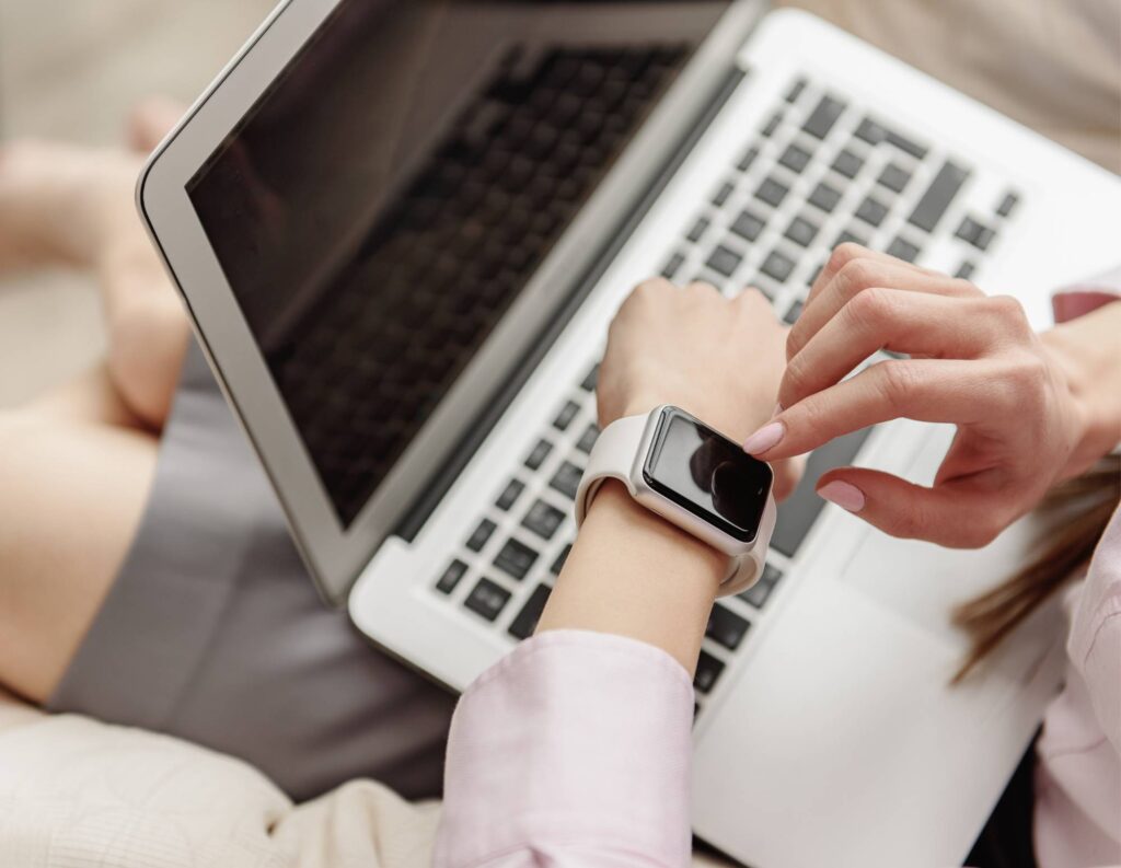 Person tracking time the time on their watch