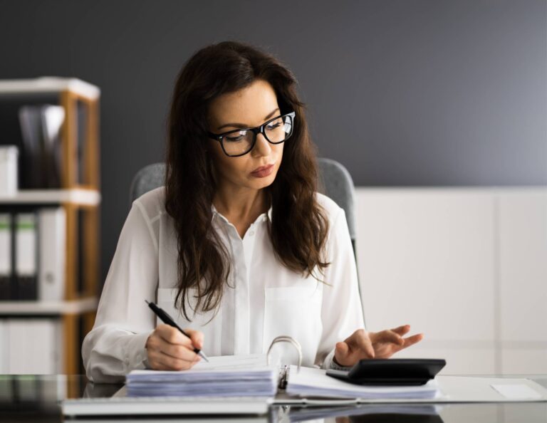 Woman working on creating an invoice