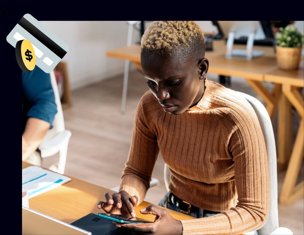 Woman writing a payment reminder email on her phone