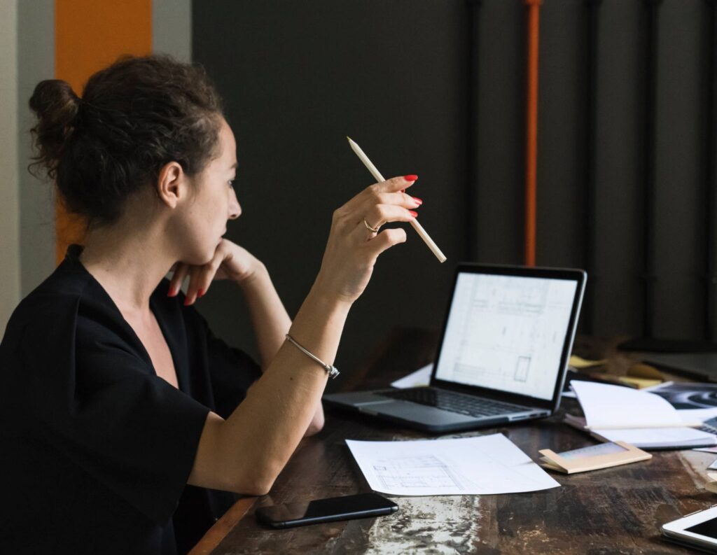 Woman conducting a project discovery session with new clients