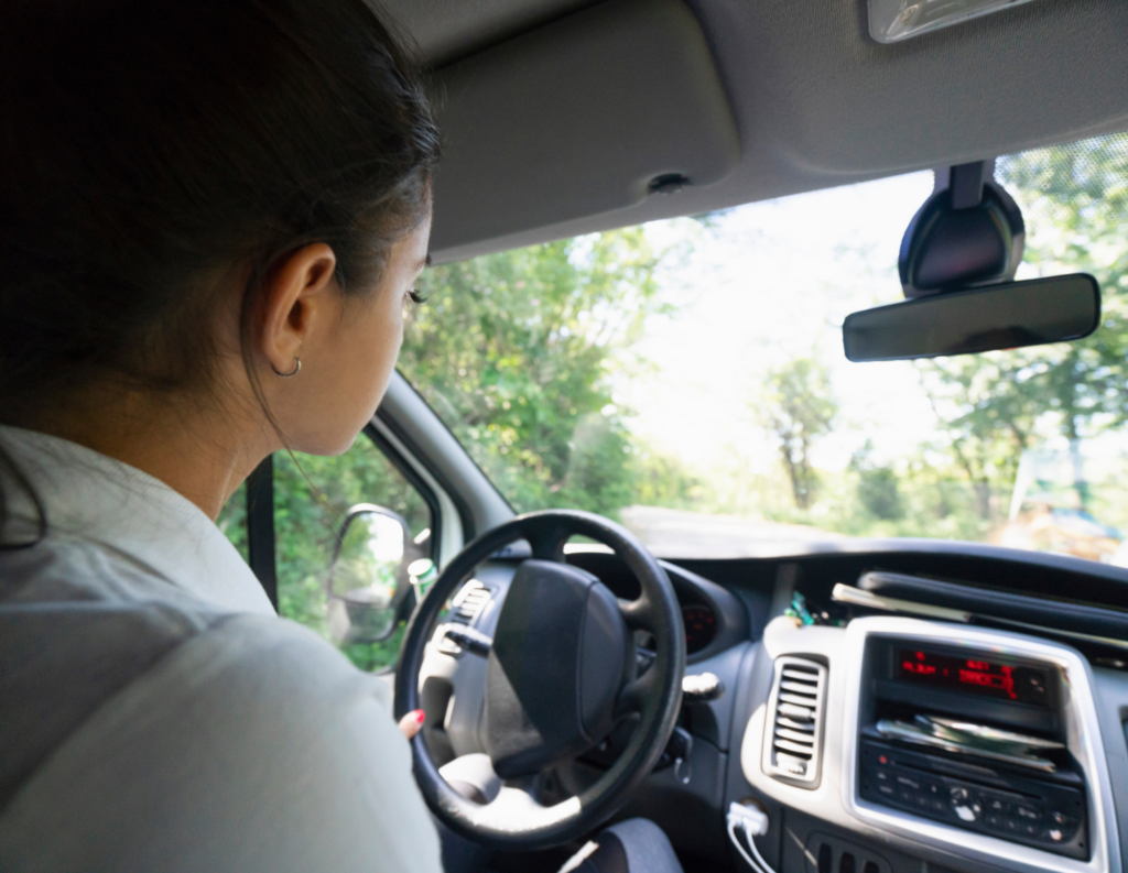 Woman driving - shows dashboard