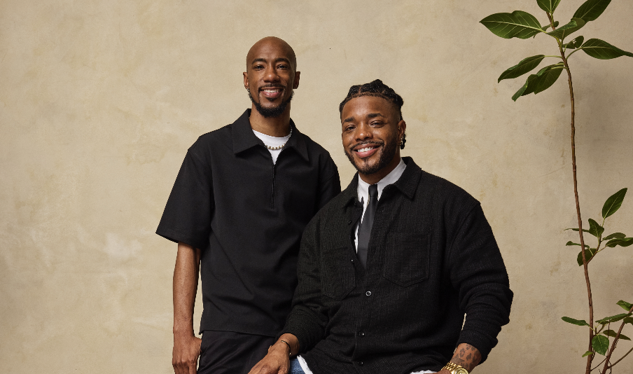 a photo of troy barnes and orlando whigham of mirror image photo booths smiling at the camera