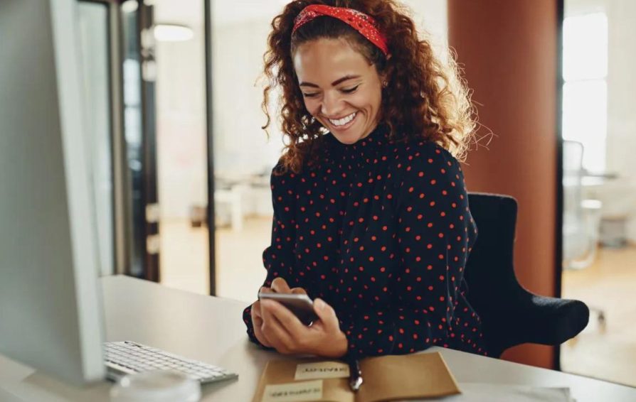 Woman using passive income apps