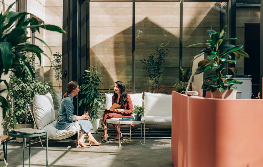 Pretty elegant businesswoman having job interview at modern company.