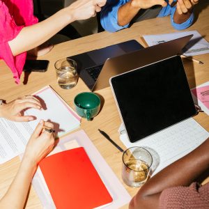 Cropped image of business team having office meeting