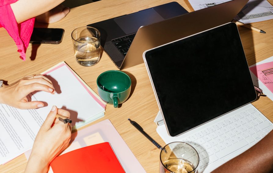 Cropped image of business team having office meeting