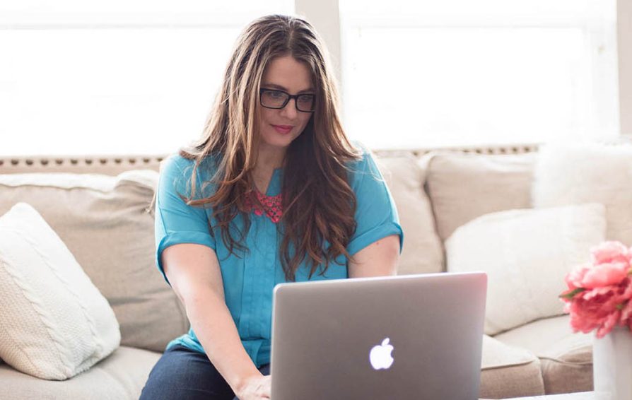 Becky Mollenkamp works on her laptop.