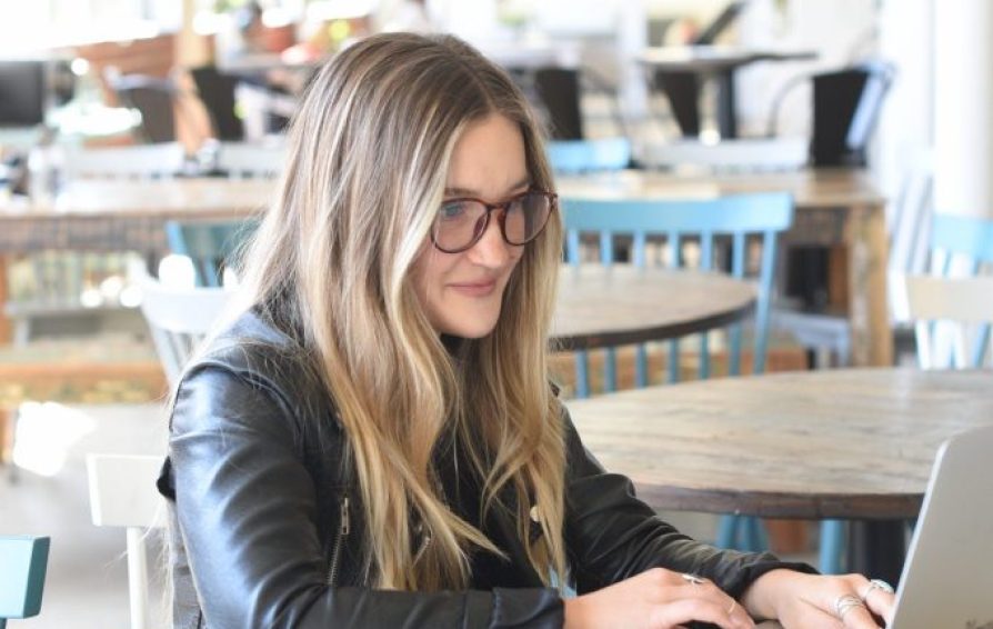 woman at her laptop learning how time management can increase productivity