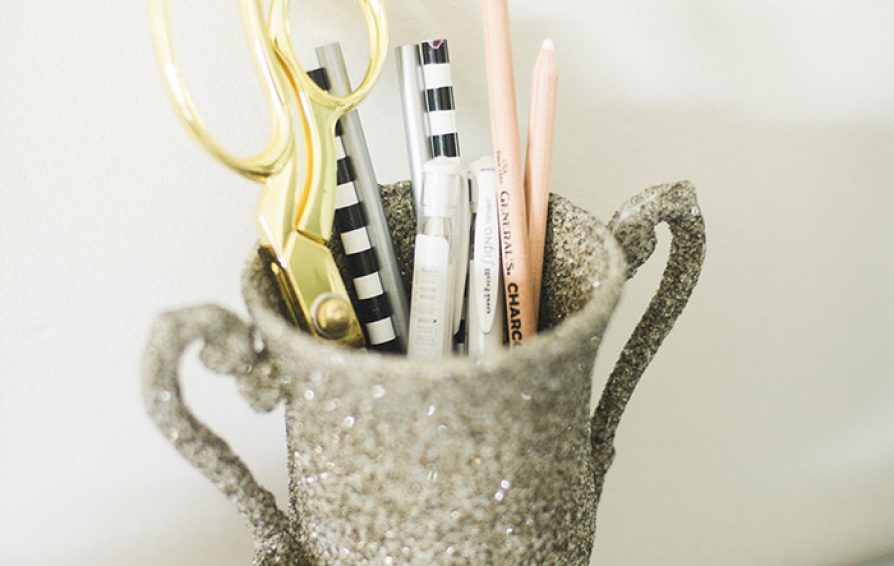 Pens and pencils in a mug
