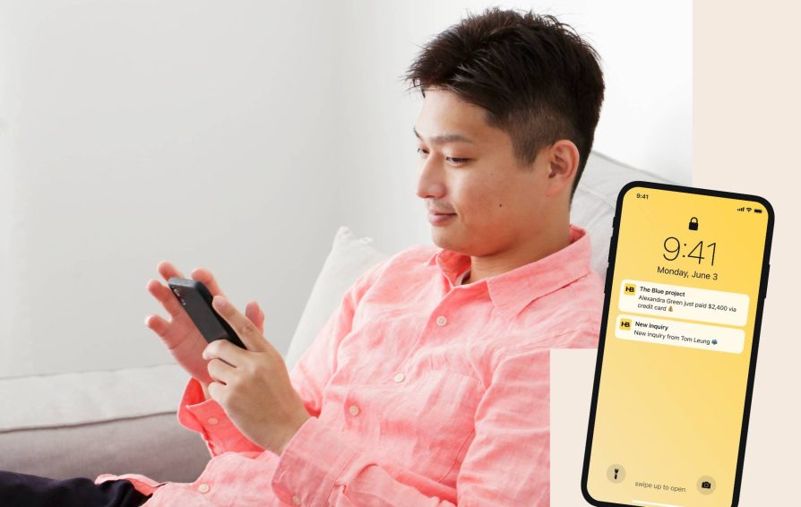 Man using the HoneyBook mobile app