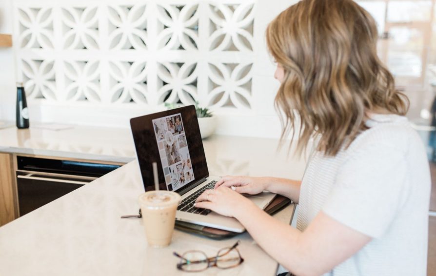 Woman sitting on computer