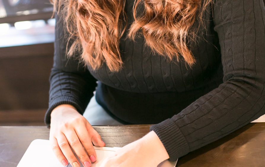 Nicole Doumato writing a blog post.