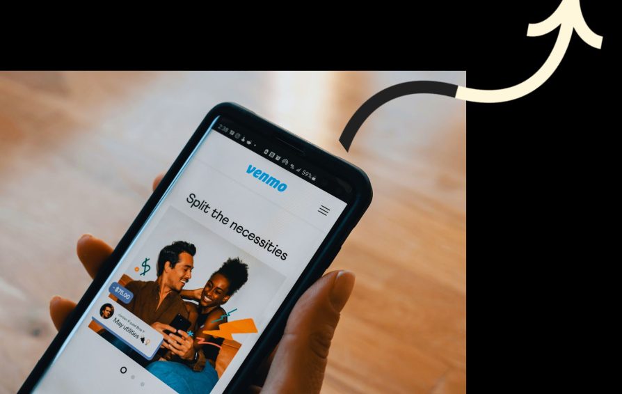 Two people on a phone screen laugh.