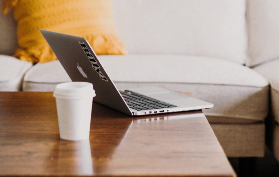 laptop on a coffee table