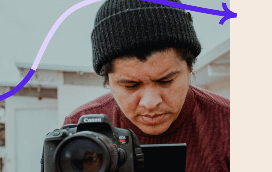 Photographer lines up a shot.