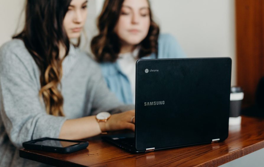 two people working on marketing strategy for pintrest