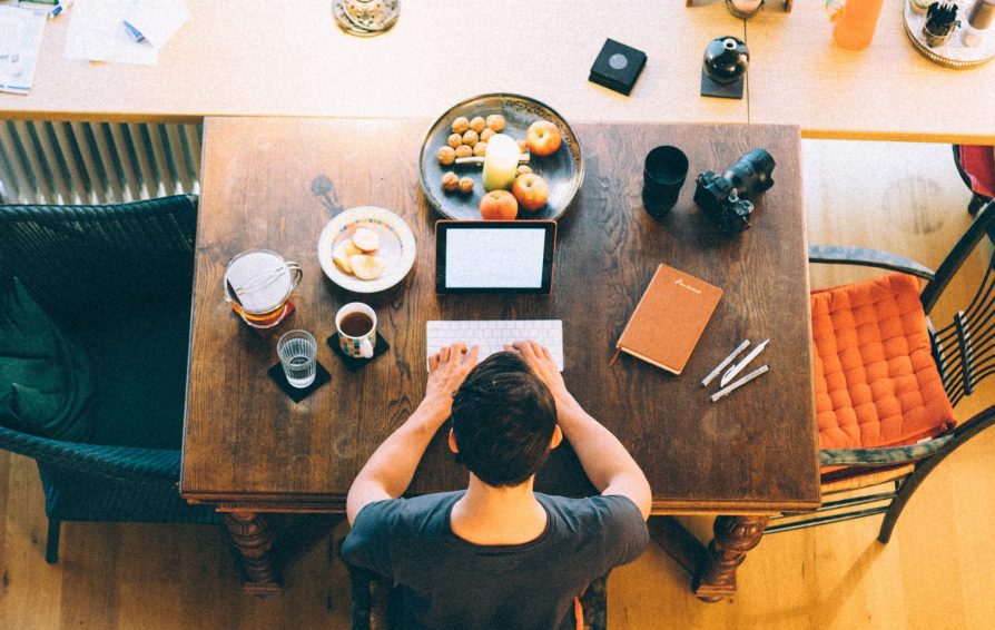 small business owner working on website seo on his laptop