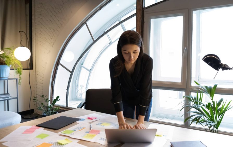 Woman creating a client management workflow