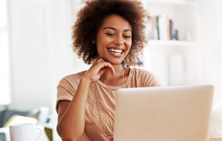 Woman on laptop using a clientflow platform
