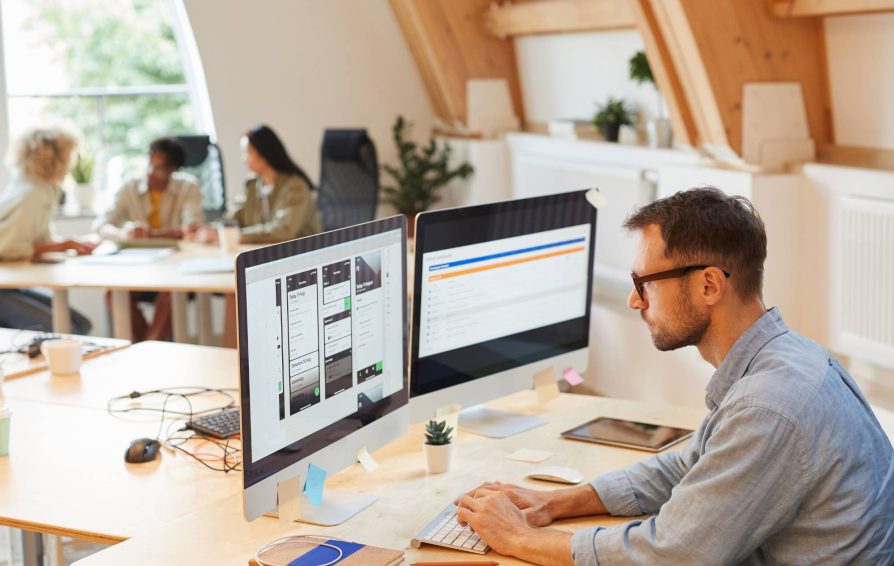 Man using a CRM for a digital marketing agency