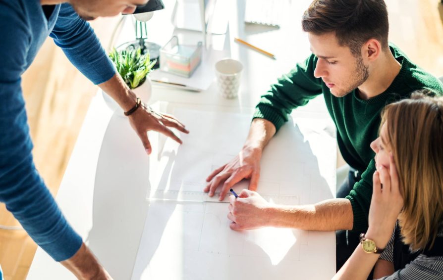 People at work using effective time management strategies
