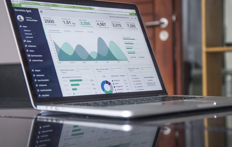Laptop showing different email marketing metrics