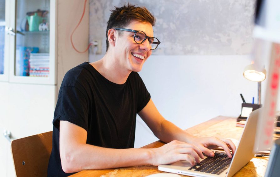 Man working on creating an invoice