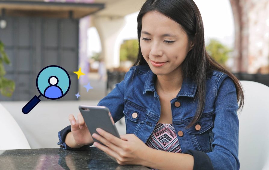 Woman on her phone with a magnifying glass lead generation illustration