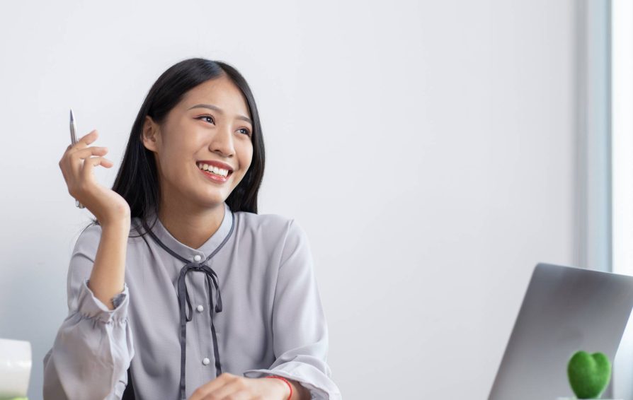 Woman determining her sales-qualified leads