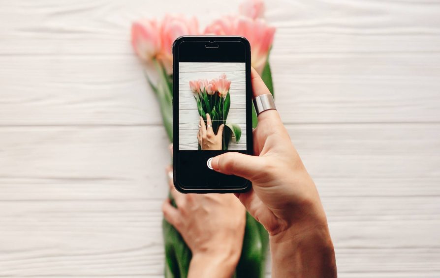 Person posting a photo on Instagram